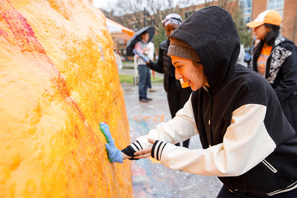 University of Tennessee Students painting the Rock.