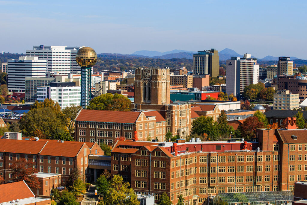 Downtown Knoxville sits just behind campus framed by a view of the Smoky Mountains